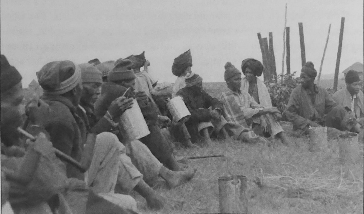 Xhosa workers. Drinking beer in the fields while working together. 1980